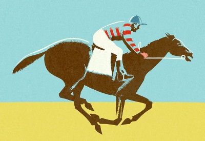 Jockey with horse running