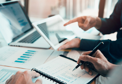 professionals reviewing charts and graphs