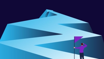 Businessman holding a flag looking at the flag farther from the top of the arrow