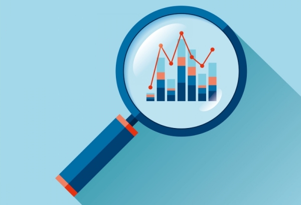 Illustration of magnifying glass focusing in on data chart